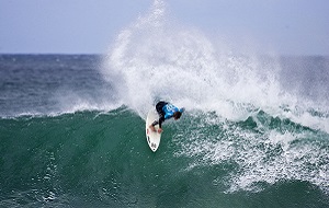 Mark Occhilupo (AUS) competing in the 2005 Billabong Pro at Jeffreys Bay, Eastern Cape, South Africa. The event was won by Kelly Slater (USA) in the dying seconds of the final. Slater defeated arch rival Andy Irons (HAW). Photo joliphotos.com